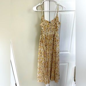 Smocked-waist pleated dress in soft posies